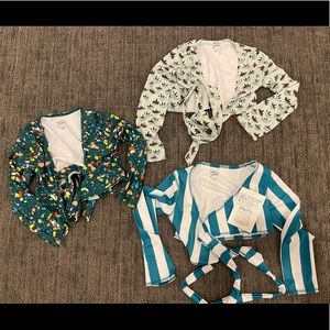 Three Kortni Jeane little girls 4/5 rashguard tops.